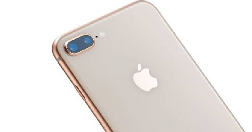 iphone mobile, w którym widzimy jego tył, aparaty i oficjalne logo Apple