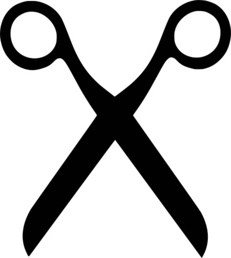 Czarna ikona nożyczek na białym tle
