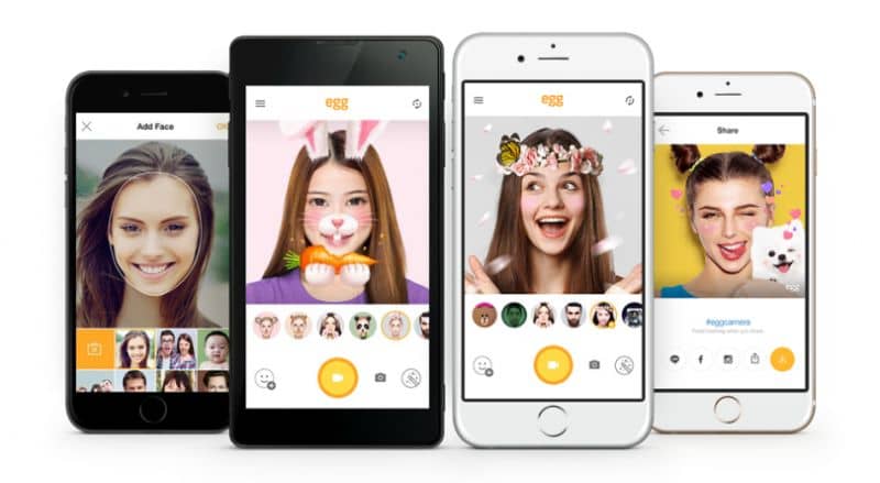 ludzie na ekranie mobilnym Snapchata z filtrami masek