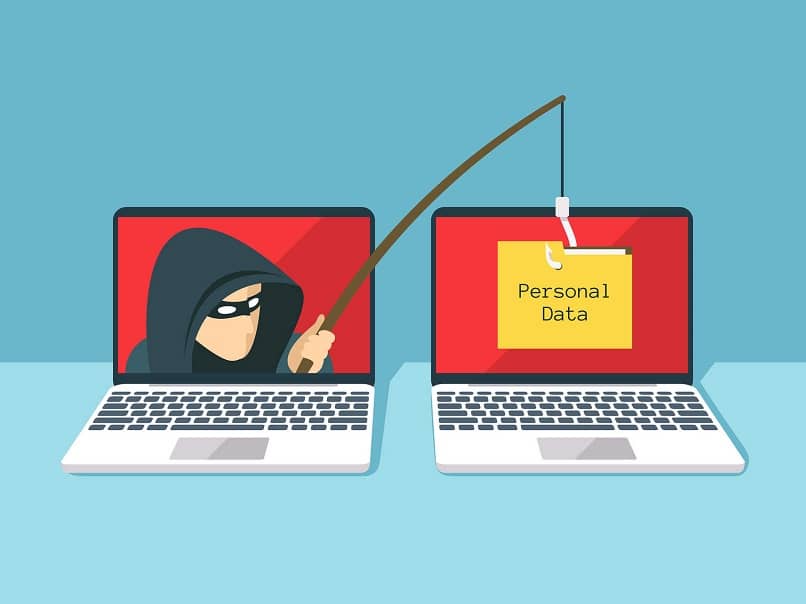 dwa laptopy inscenizujące kradzież danych osobowych