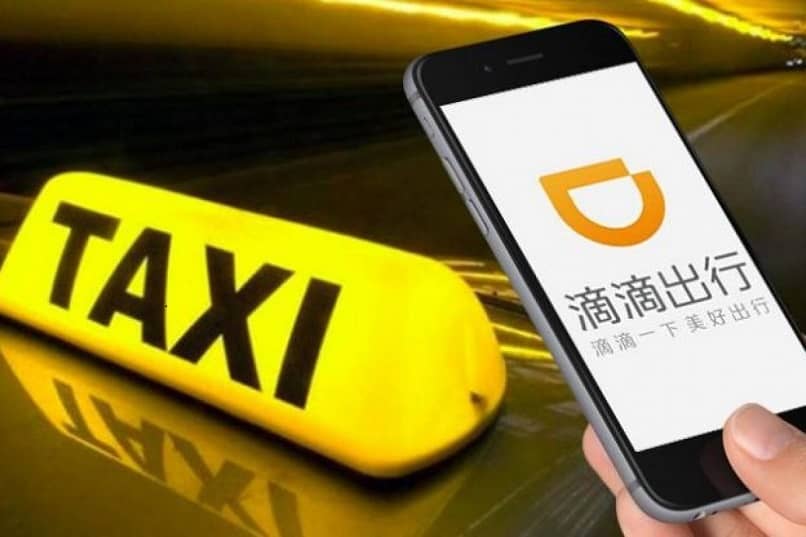 didi aplikacja z Chin z taksówką i telefonem komórkowym