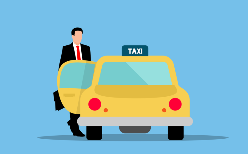 użytkownik wchodzący do uber taxi